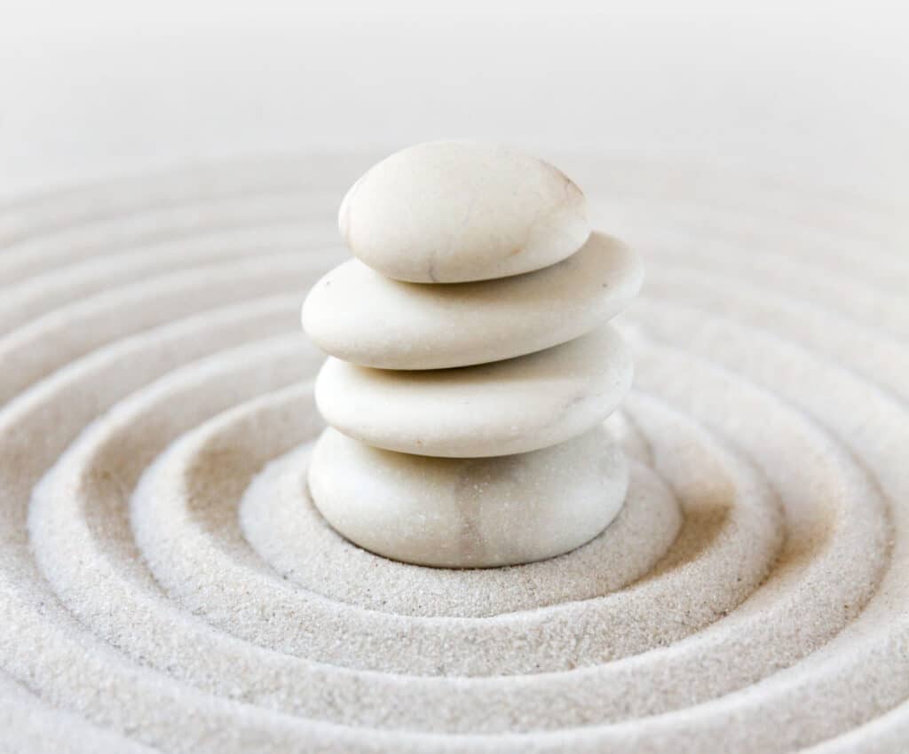 Stones on sand background