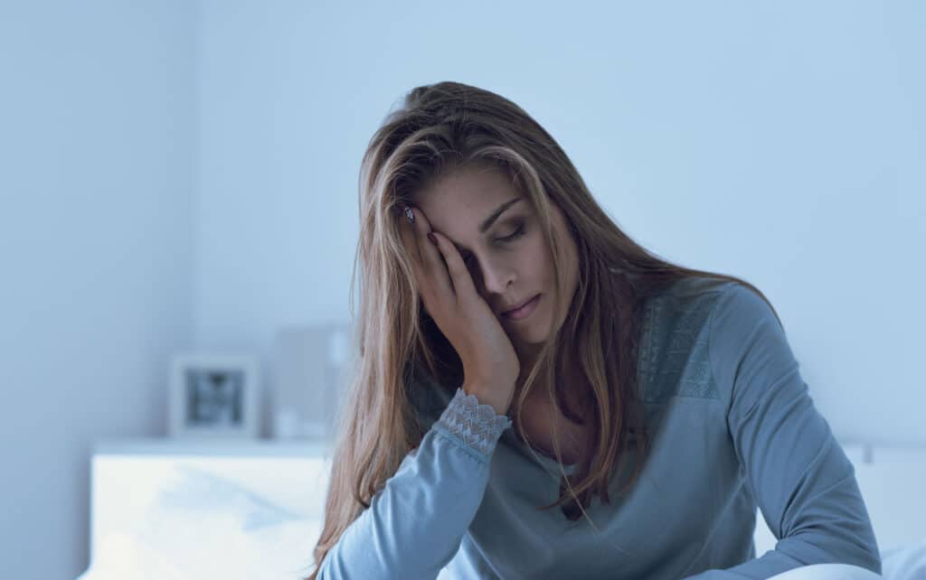 Woman waking up from sleep